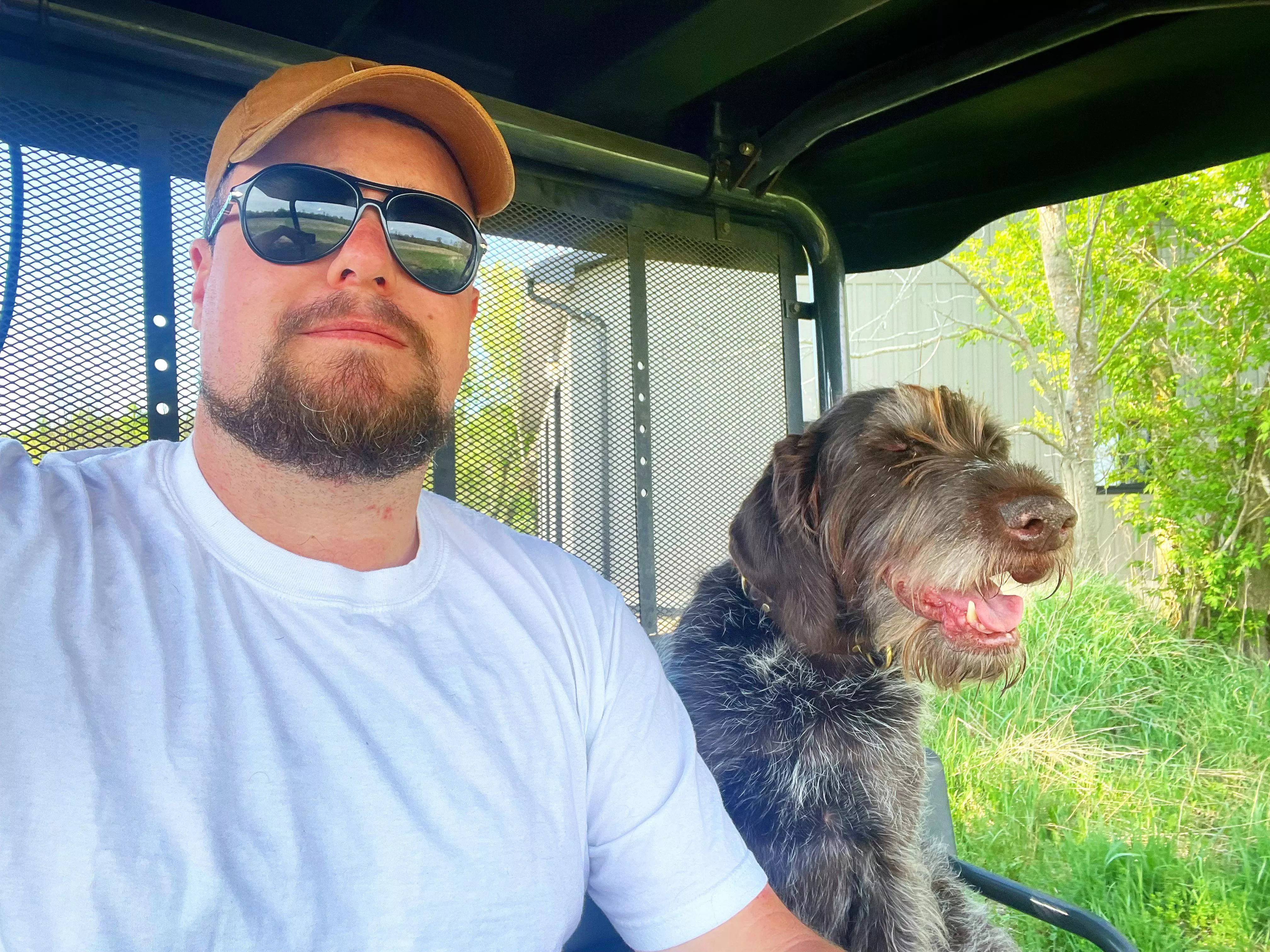 A man and a dog, out for a ride posted by Jjgilchr