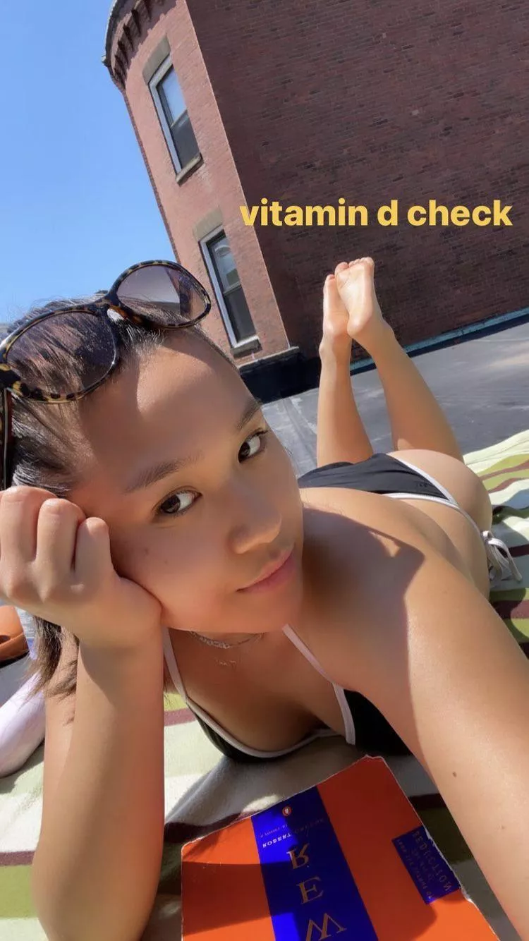 Asian cutie sunbathing booty posted by acctceleb2