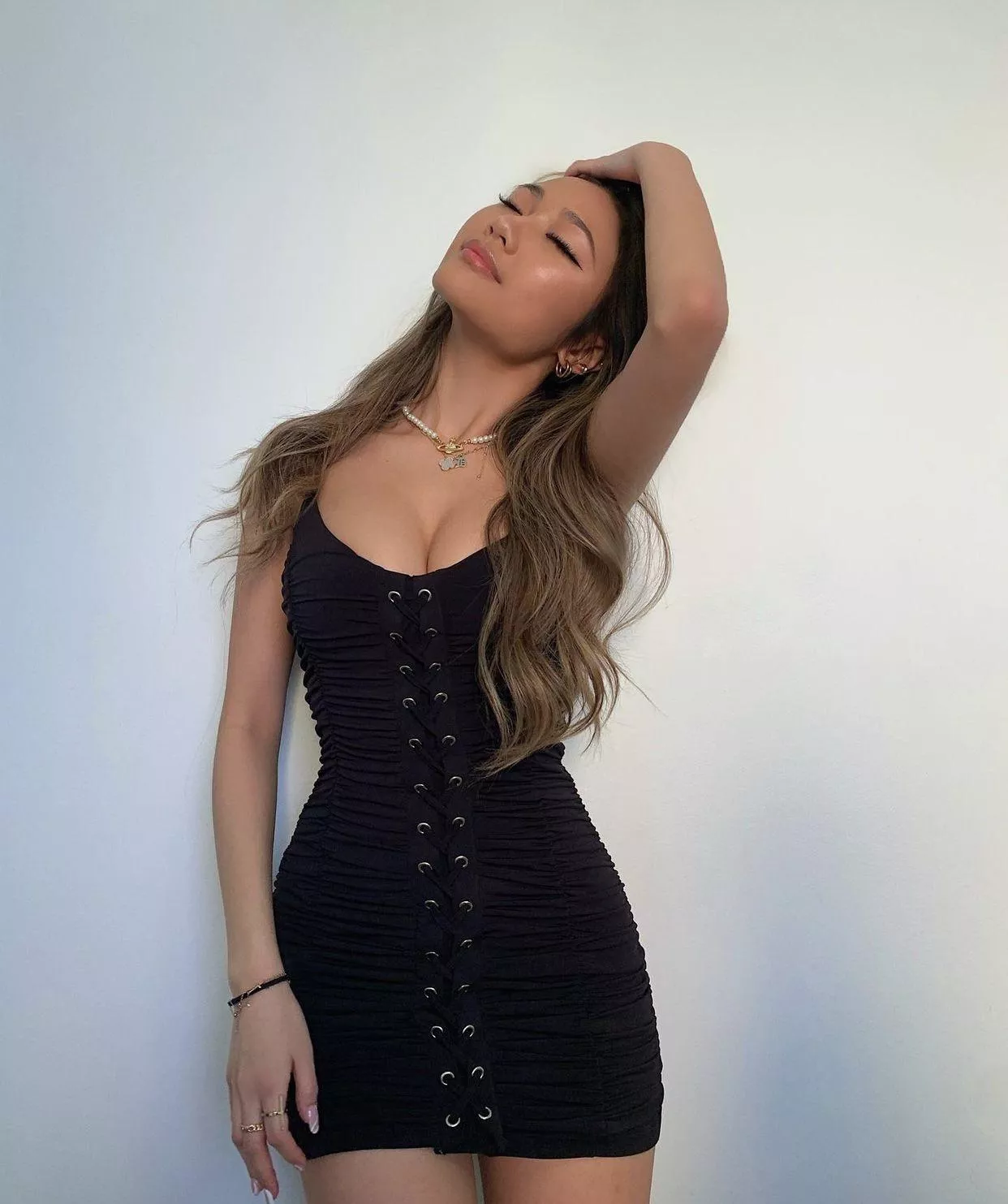 Asian kn tight black dress looking stunning posted by ResponsiveCock