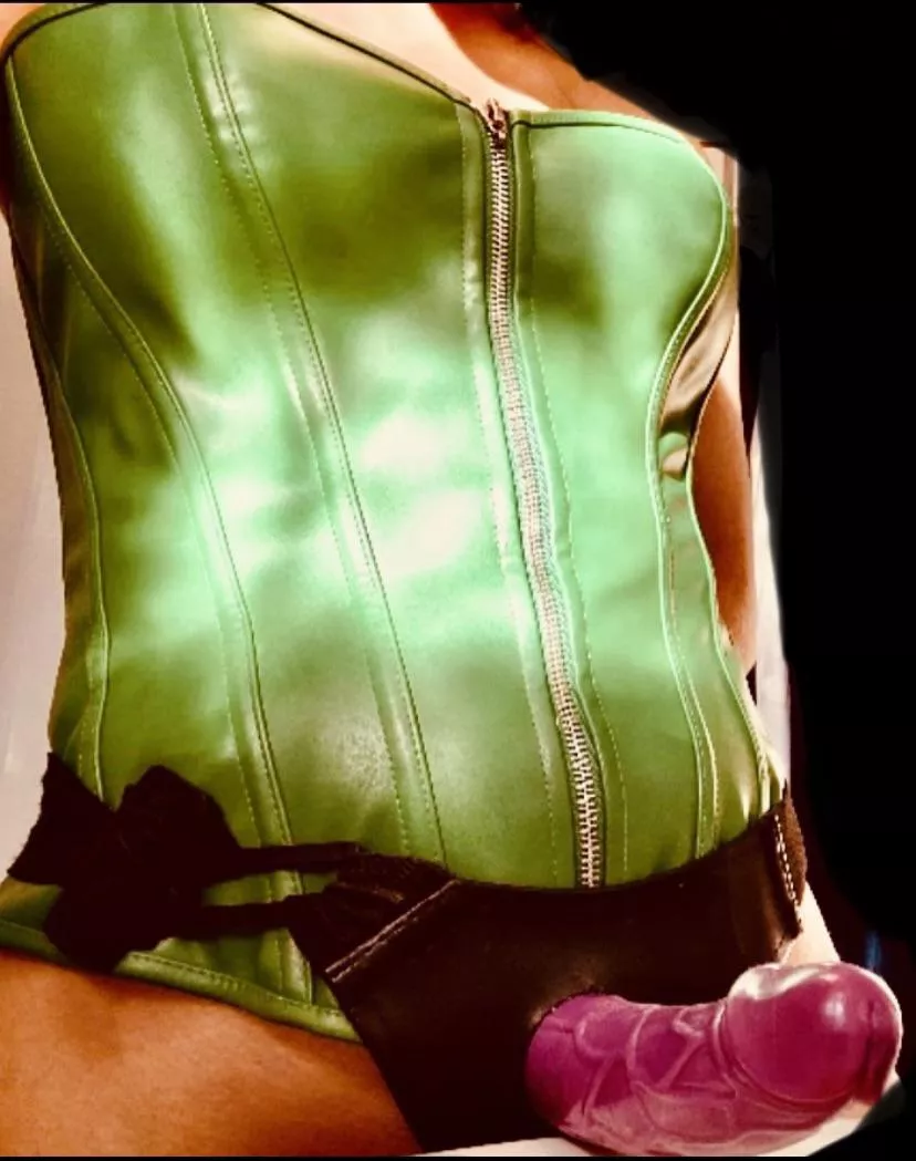 Leather corsets and strapons go together almost as well as purple and green! Now letâ€™s cut to the chase, face down ass up and be a good boy ðŸ˜ˆ posted by Poisonivy309