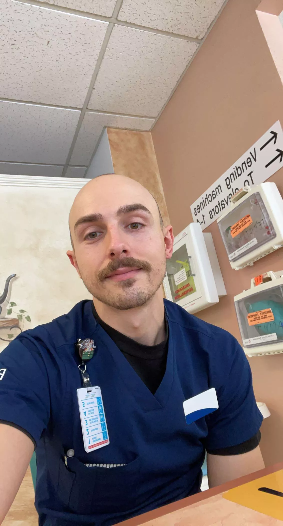 My first post: just a selfie in my student scrubs posted by TuxedoCatShogi