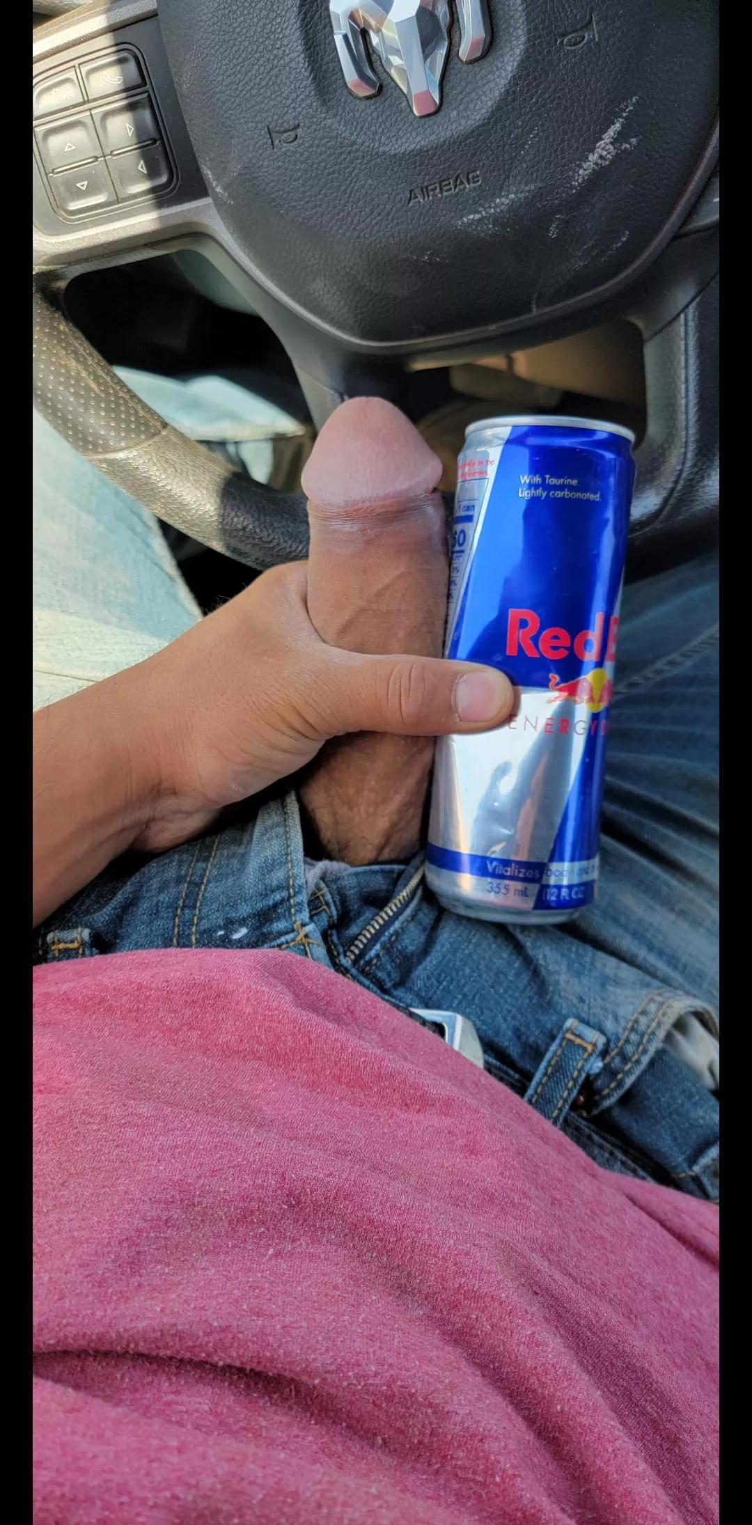 next to a red bull can and at work lol posted by TexasE96