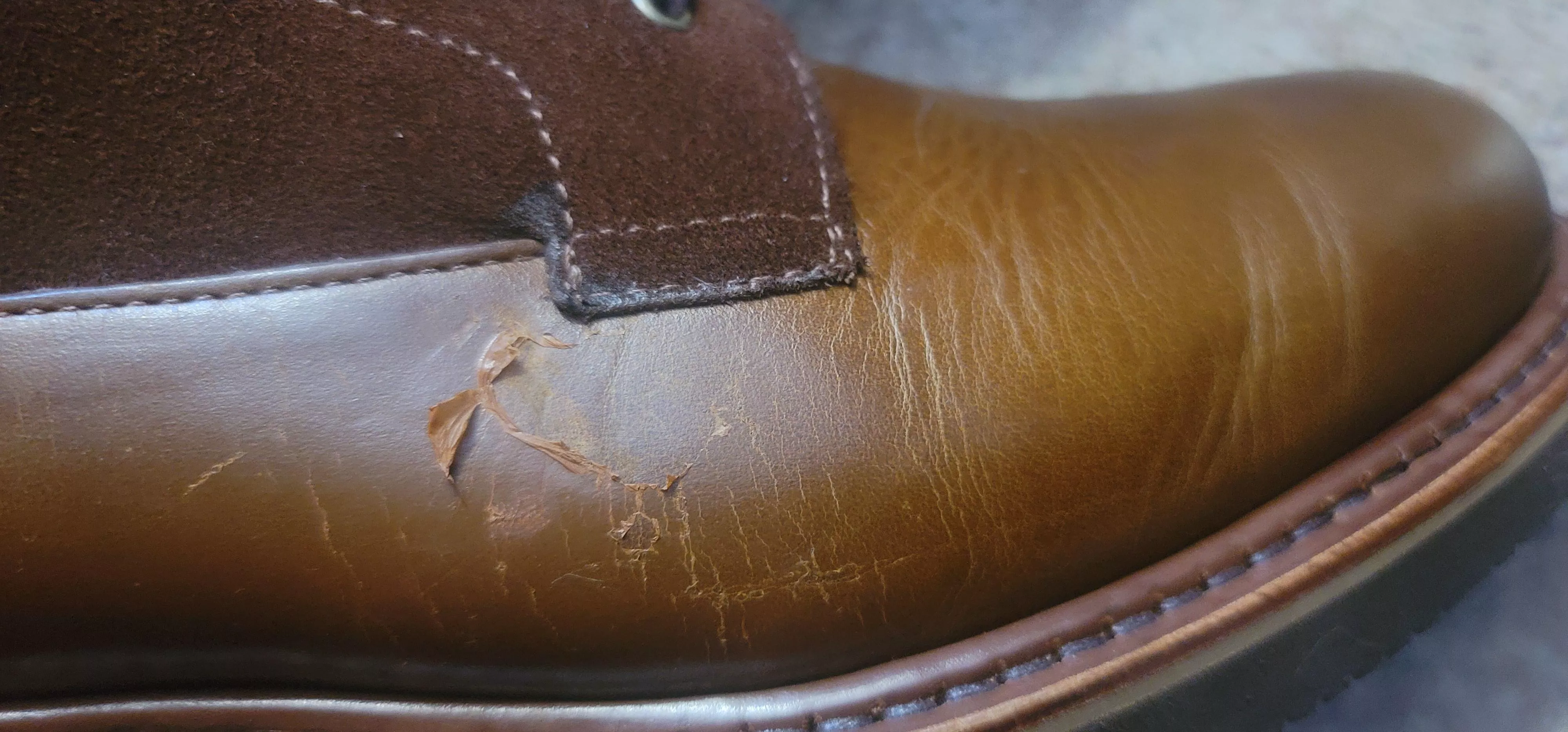 Peeling coating or something on leather of boot? posted by Wyzen