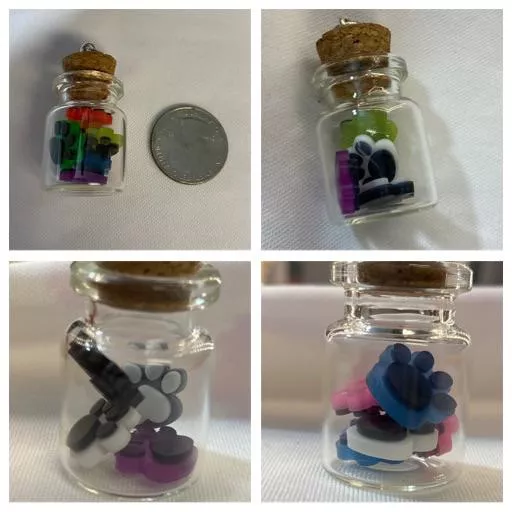 Pride paw bottles I started making posted by Laughingfoxcreates