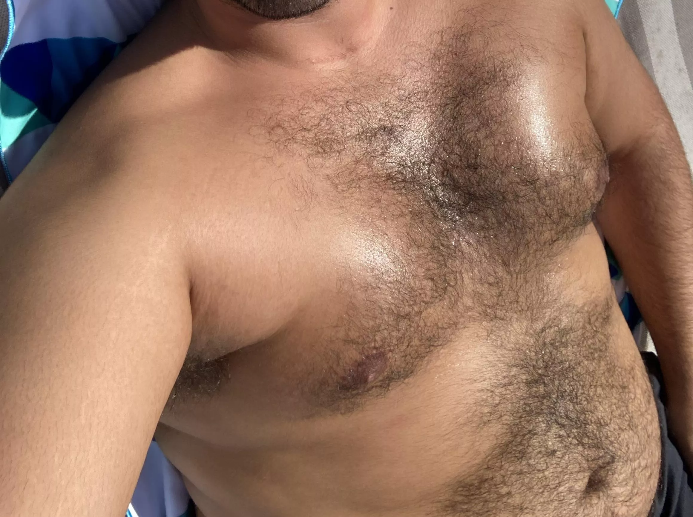 (25yo) Might skip next years trim, the hair seems to compliment my new bear body and tan! posted by HWPGrower