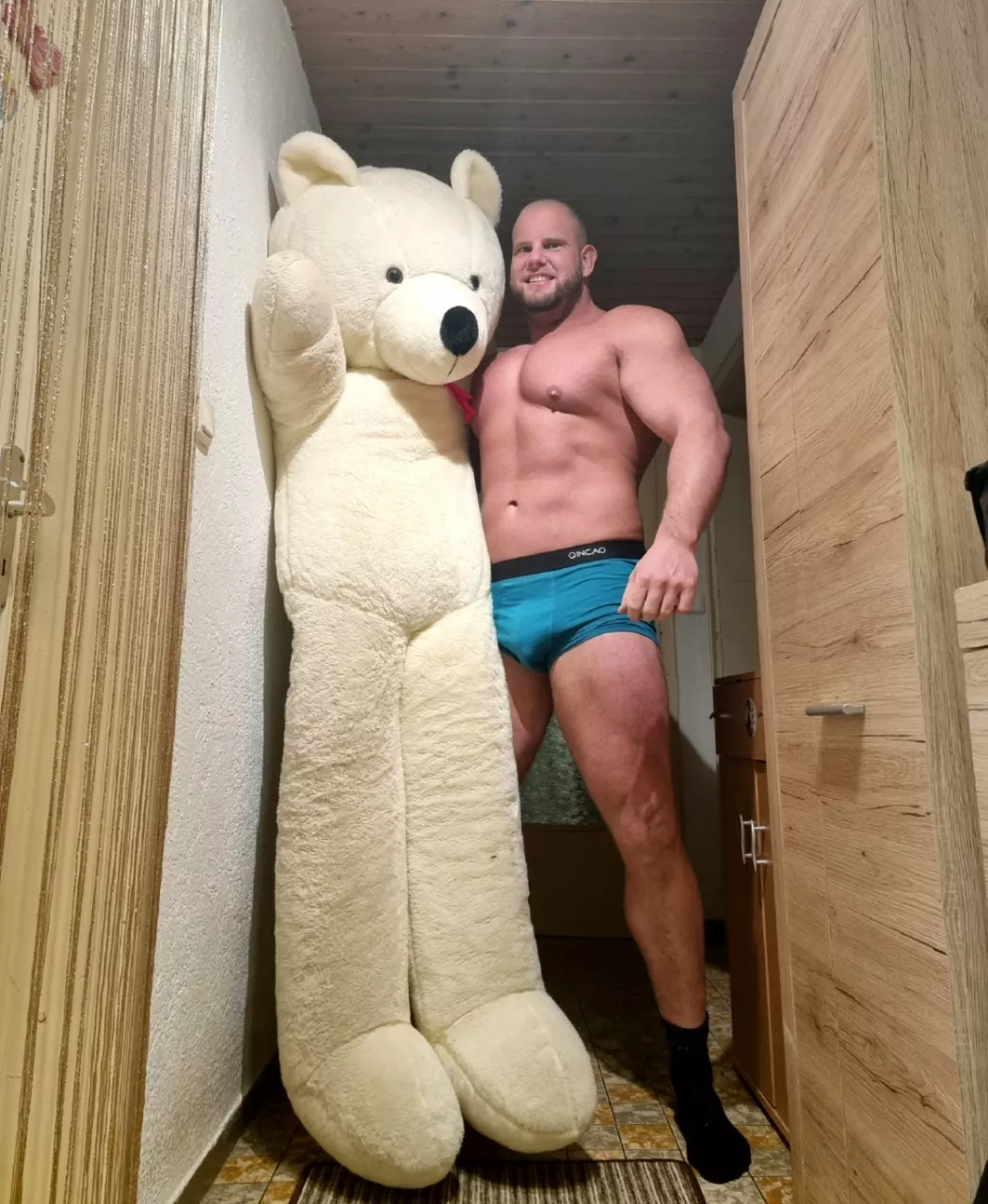 A big man needs a big teddy 🥰 posted by Wrong-Engineering-74