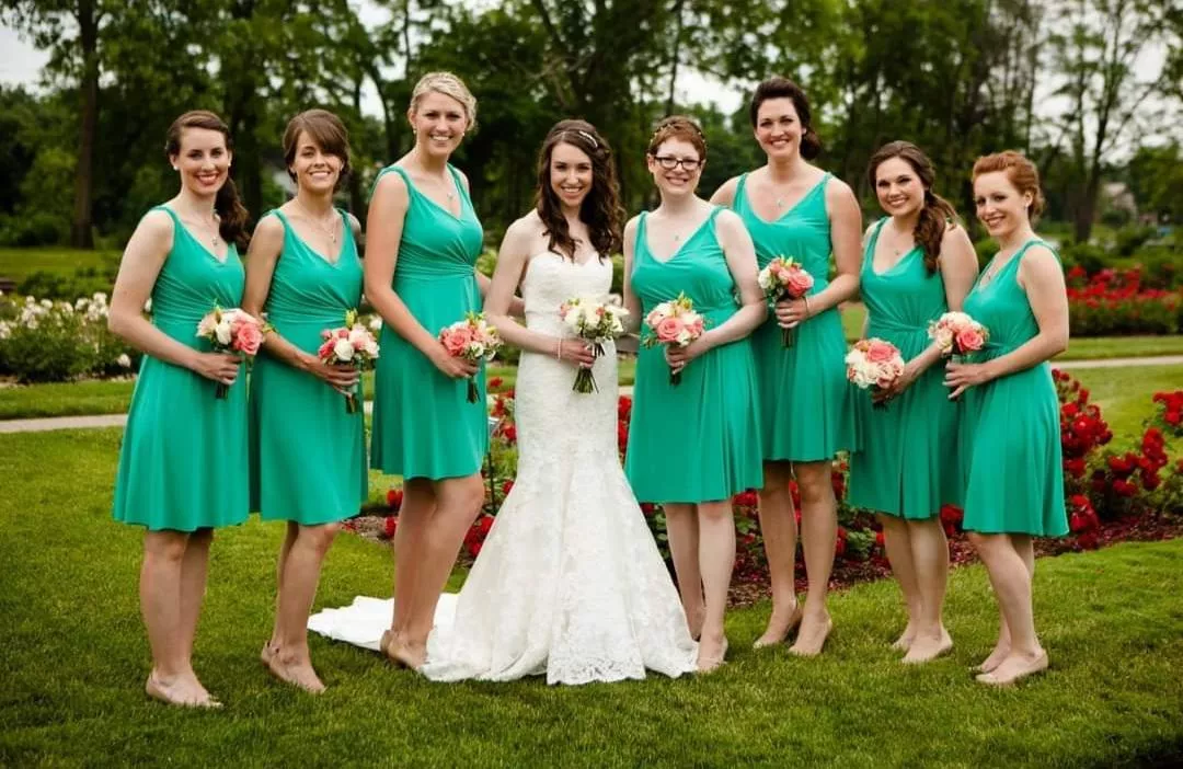 A bride with her bridesmaids posted by throw_away_1010220