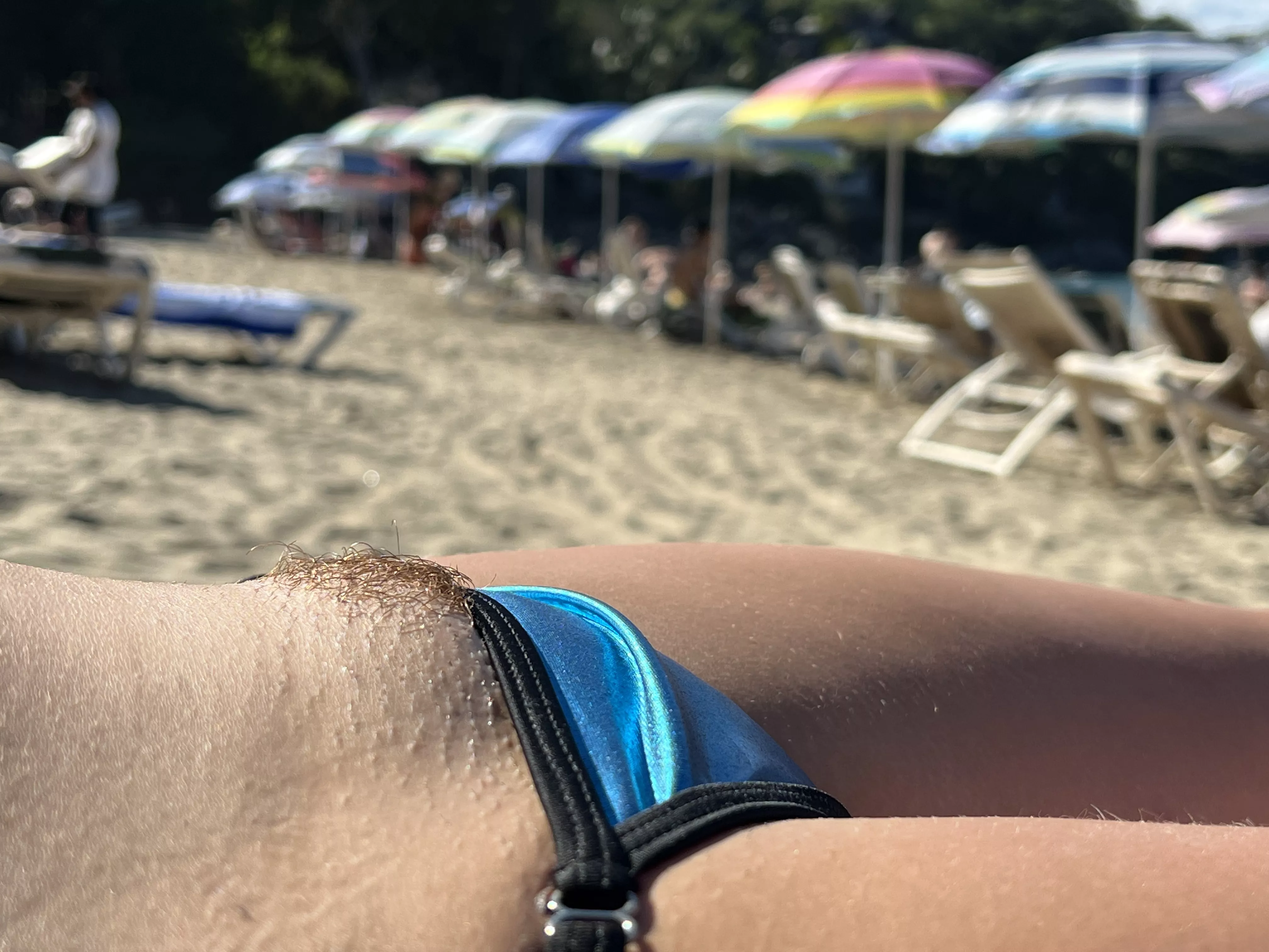 A little peek of my hairy mound at the beach. posted by tiny_t_cookie