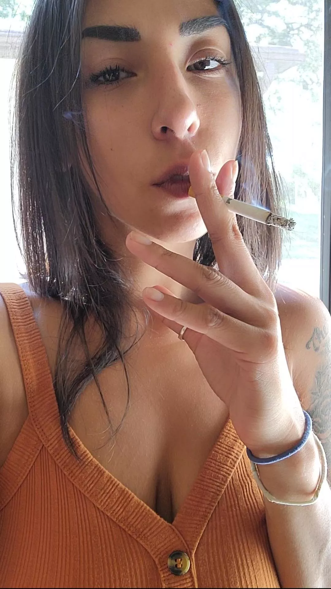 A smoking natural beauty🚬 😌 posted by Alternative-Oil-2220