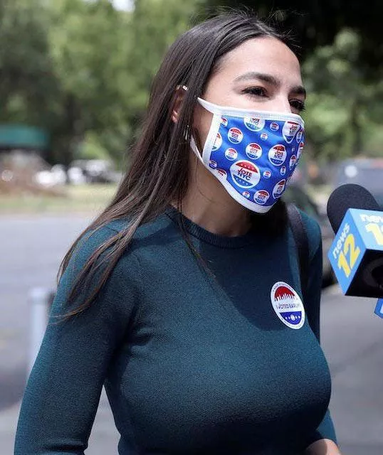 AOC tries to hide her mommy milkers but sheâ€™s lowkey STACKED posted by theeyepatchguy