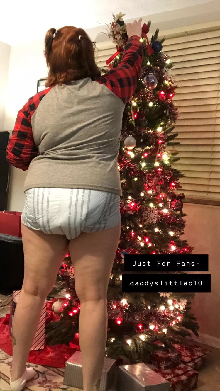 Baby putting the topper on the tree posted by Daddyslittlepissbaby