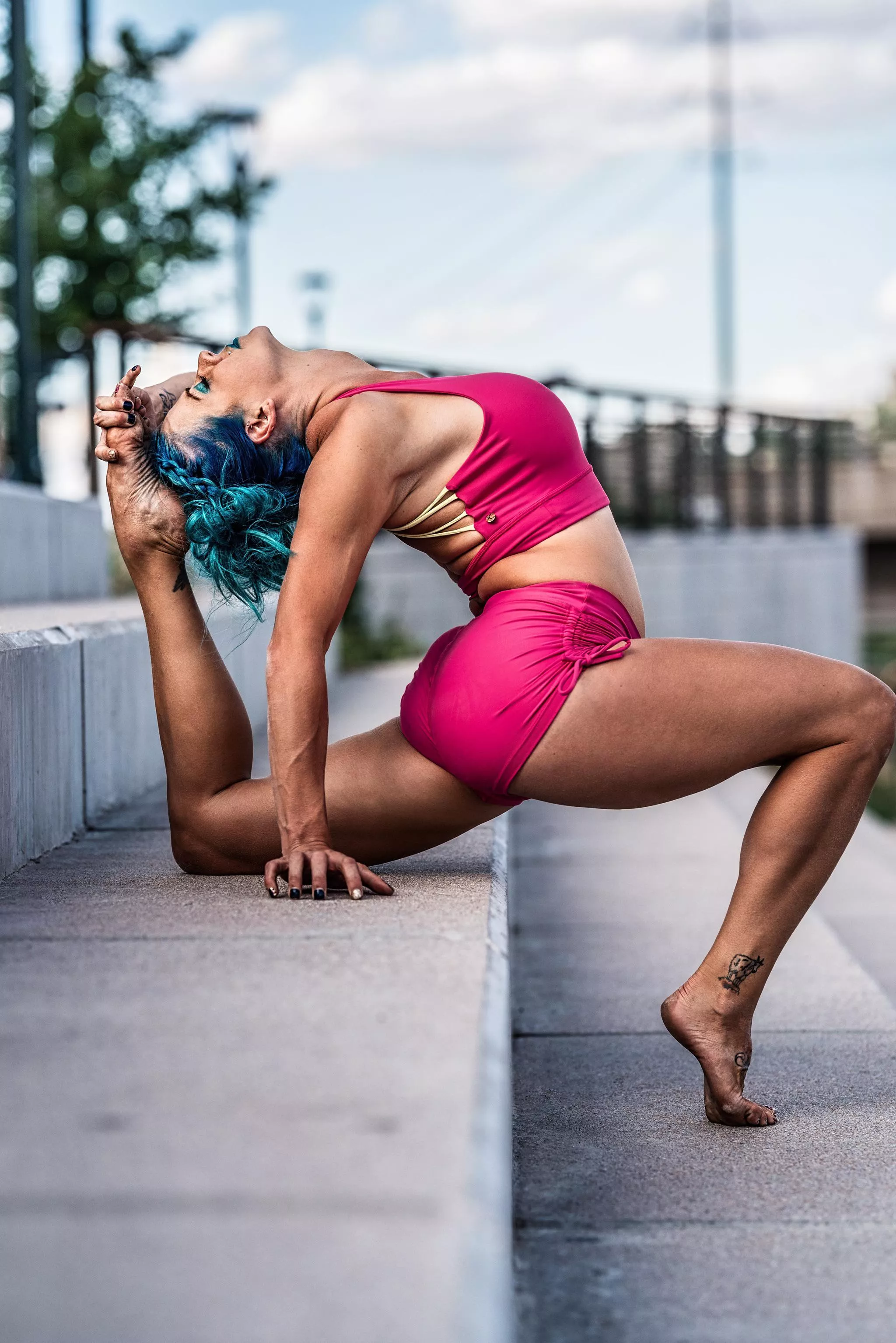 Beautiful Eka Pada Rajakapotasana from blue haired yoga girl Cherise. Exploring yoga poses on all the urban landscape. posted by YogaPhotographer