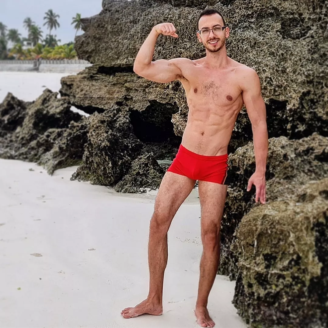 Biceps flex on a beach day posted by FitManDan1