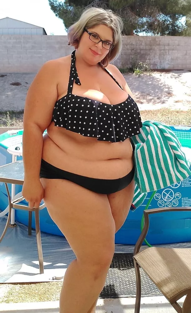 Bikini babe by her backyard pool posted by Udderluvr2020