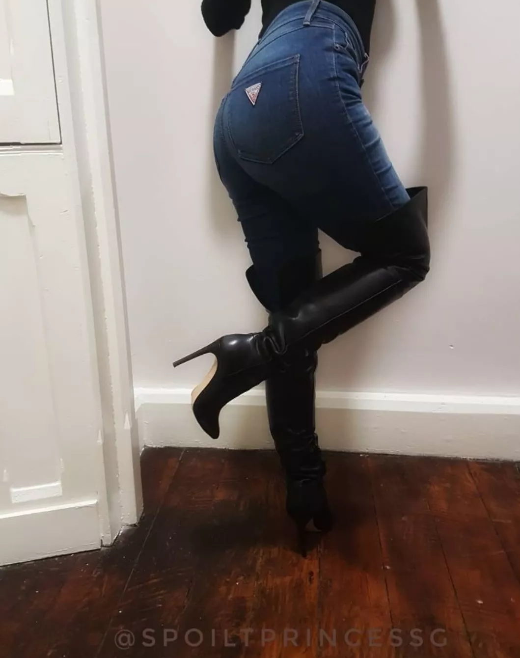 Black leather boots with blue jeans. posted by SpoiltPrincessG