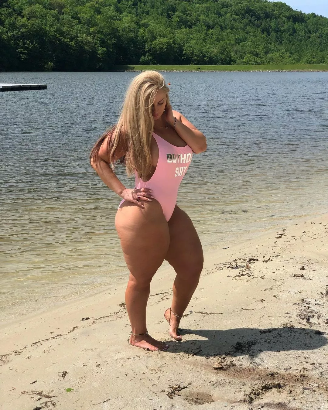 Blonde with thick thighs in a pink one-piece posted by Udderluvr2020