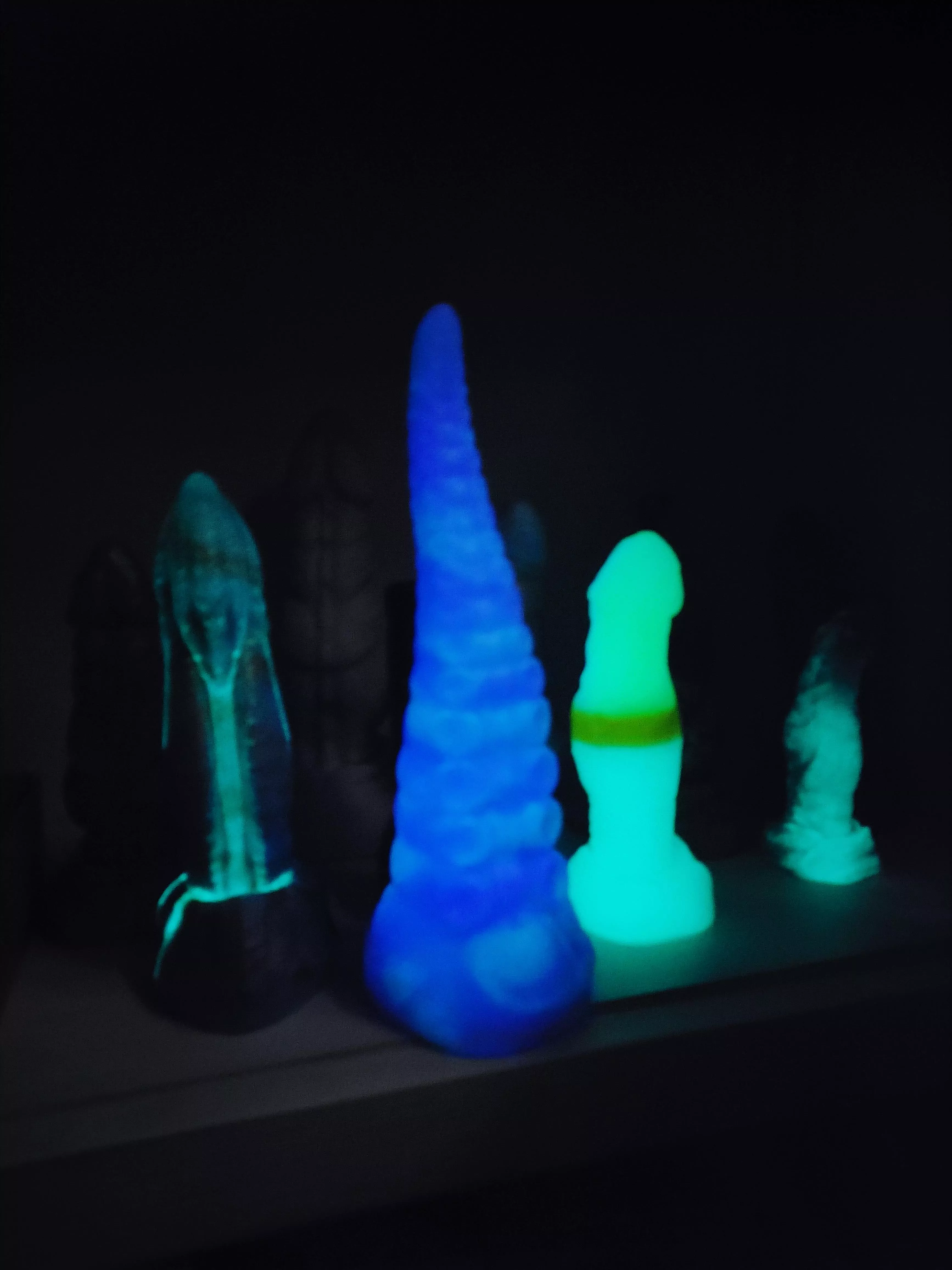 Bought a UV flashlight and discovered we had more GITD toys than we thought 😁 posted by HeHasNoRegerts