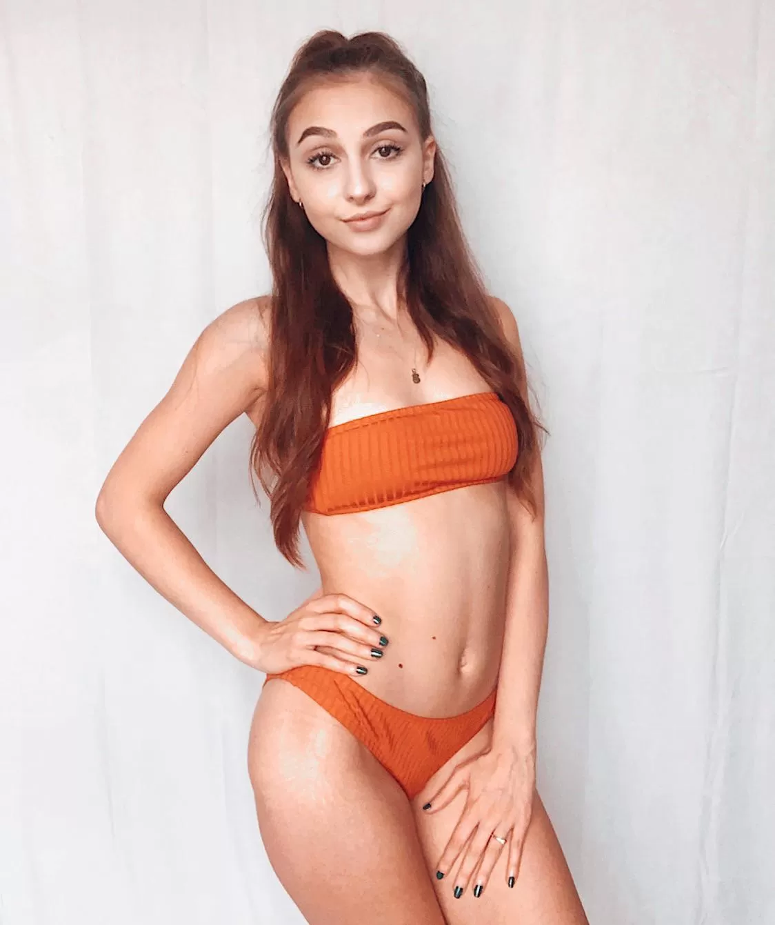 Brunette girl in an orange bikini ðŸŠ posted by Sylksmooth