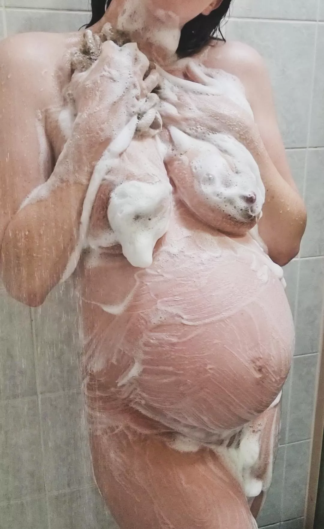 Bubbly pregnant baby belly in the shower posted by bec-au93