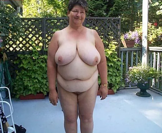 Busty mature nudist on her patio posted by Udderluvr2020