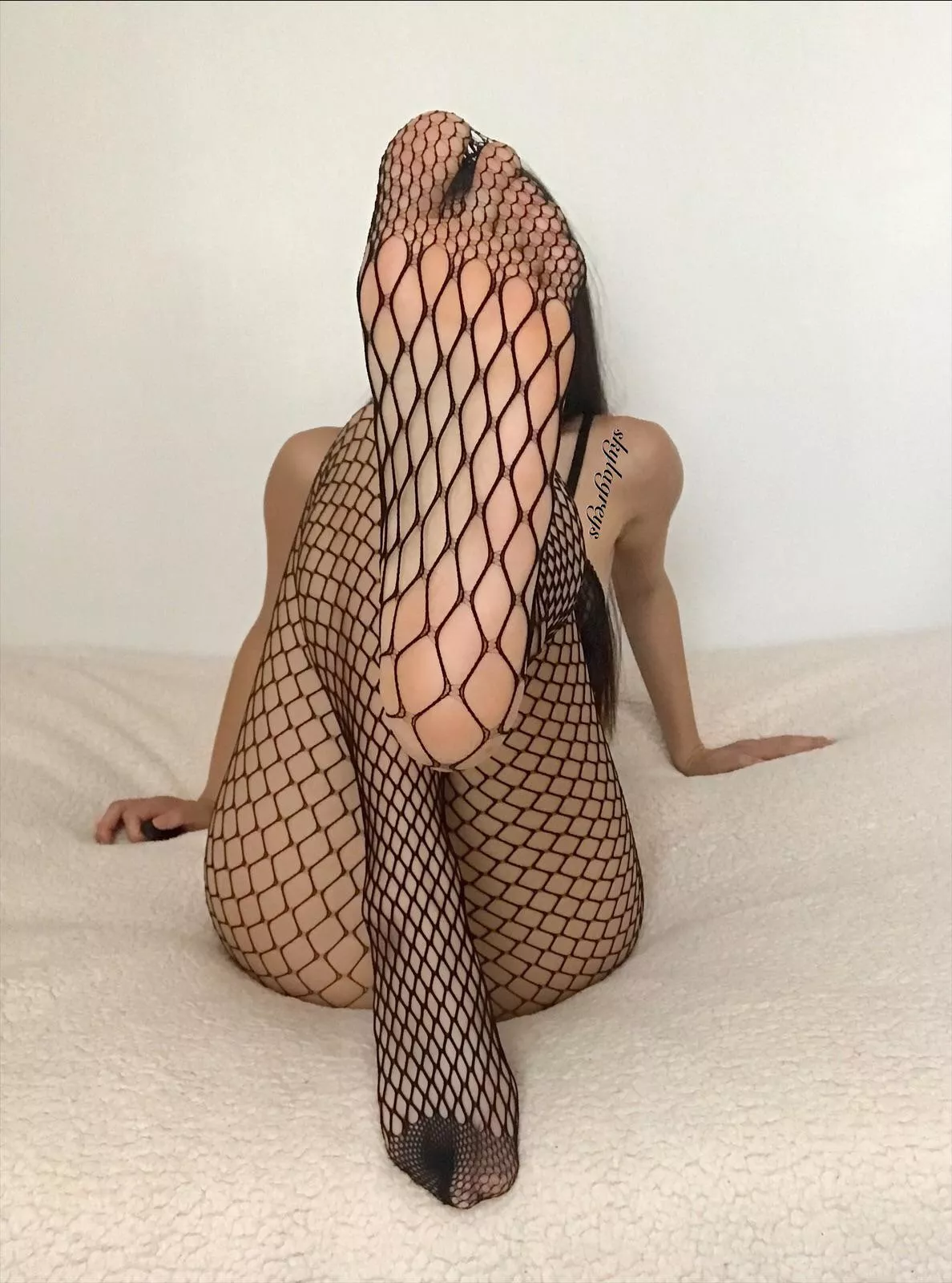 Can the fishnets stay on or would you rip it off? posted by skylagreys