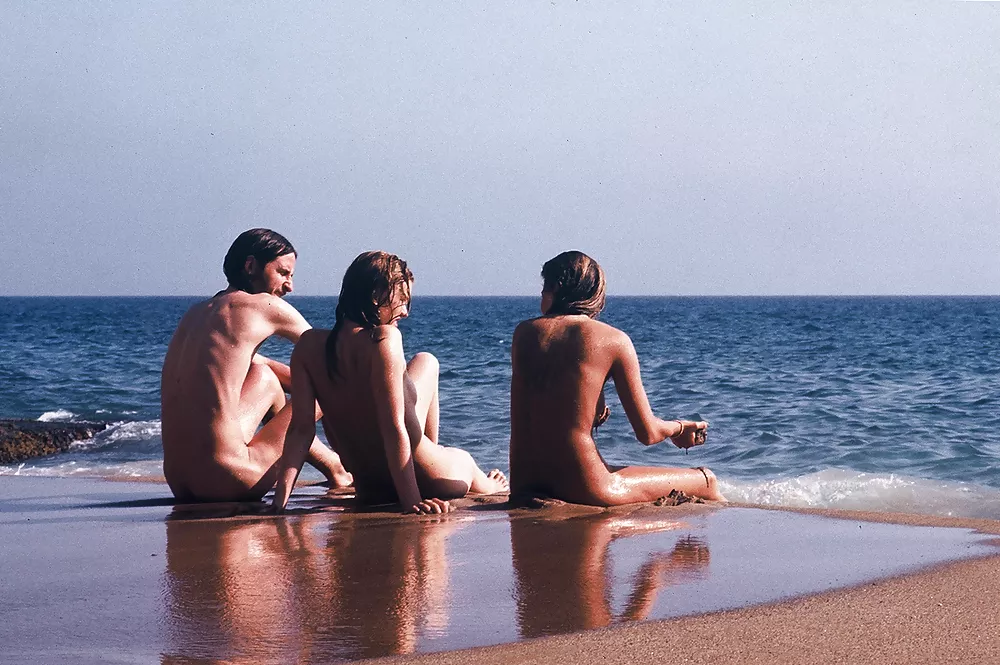 Chatting, sitting on the dock... posted by NaturistPictures