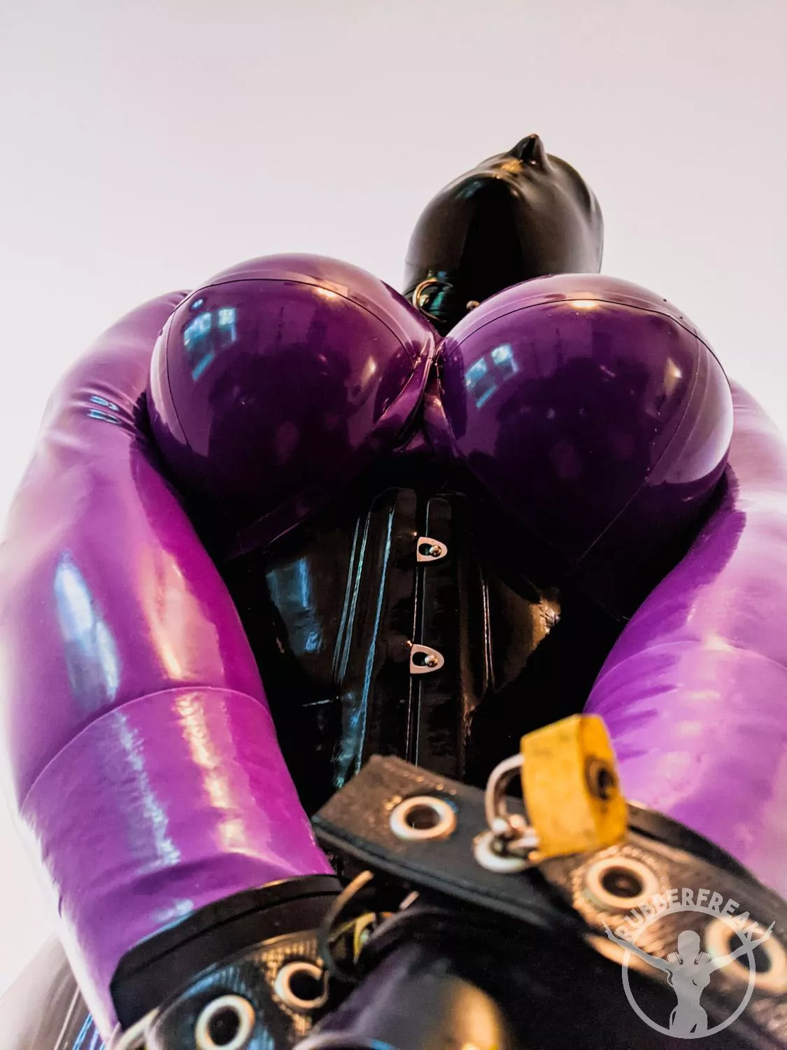 Cuffed. Locked. posted by kinkyrubberdoll