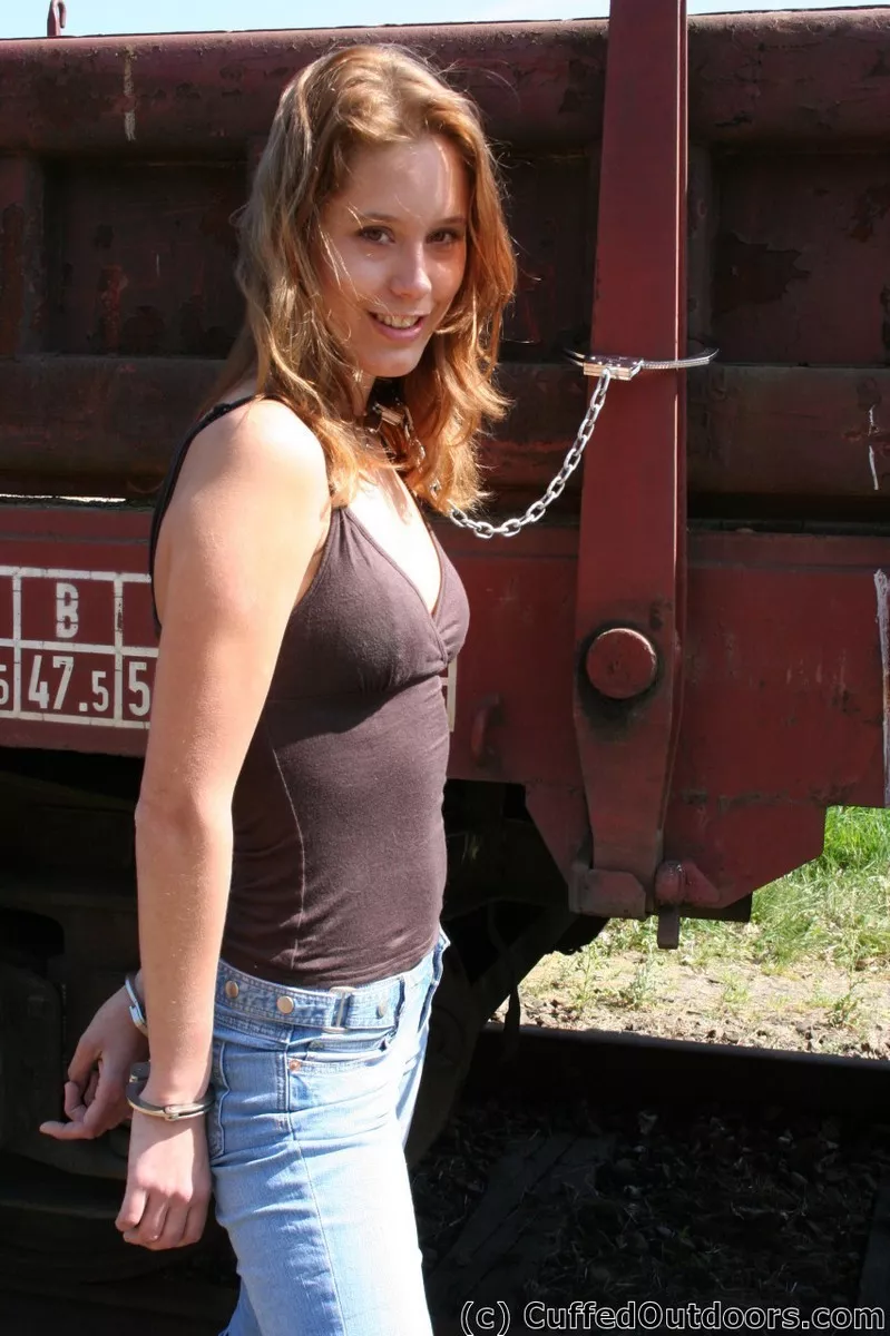 Cuffed to a Train (x-post from /r/OutdoorBondage) posted by NotStPatrick