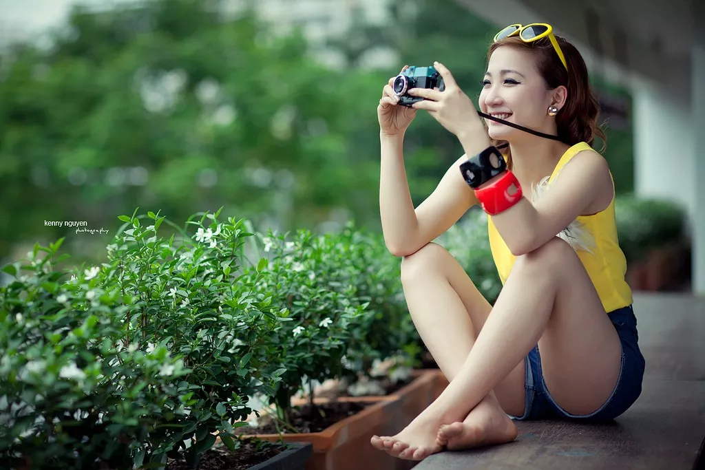 Cute Asian taking a photo posted by krhaert1