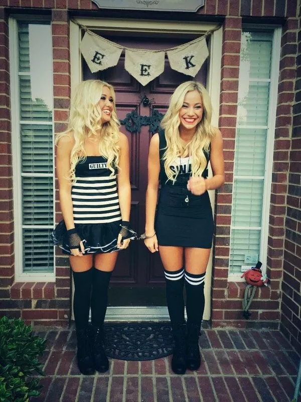 Cute blondes cuffed together posted by dailybabe