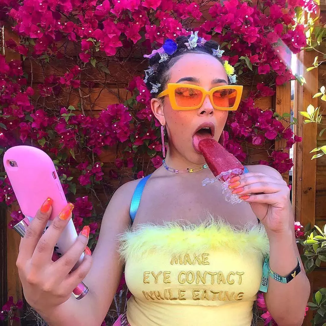 Doja cat and her popsicle posted by sashanoeve