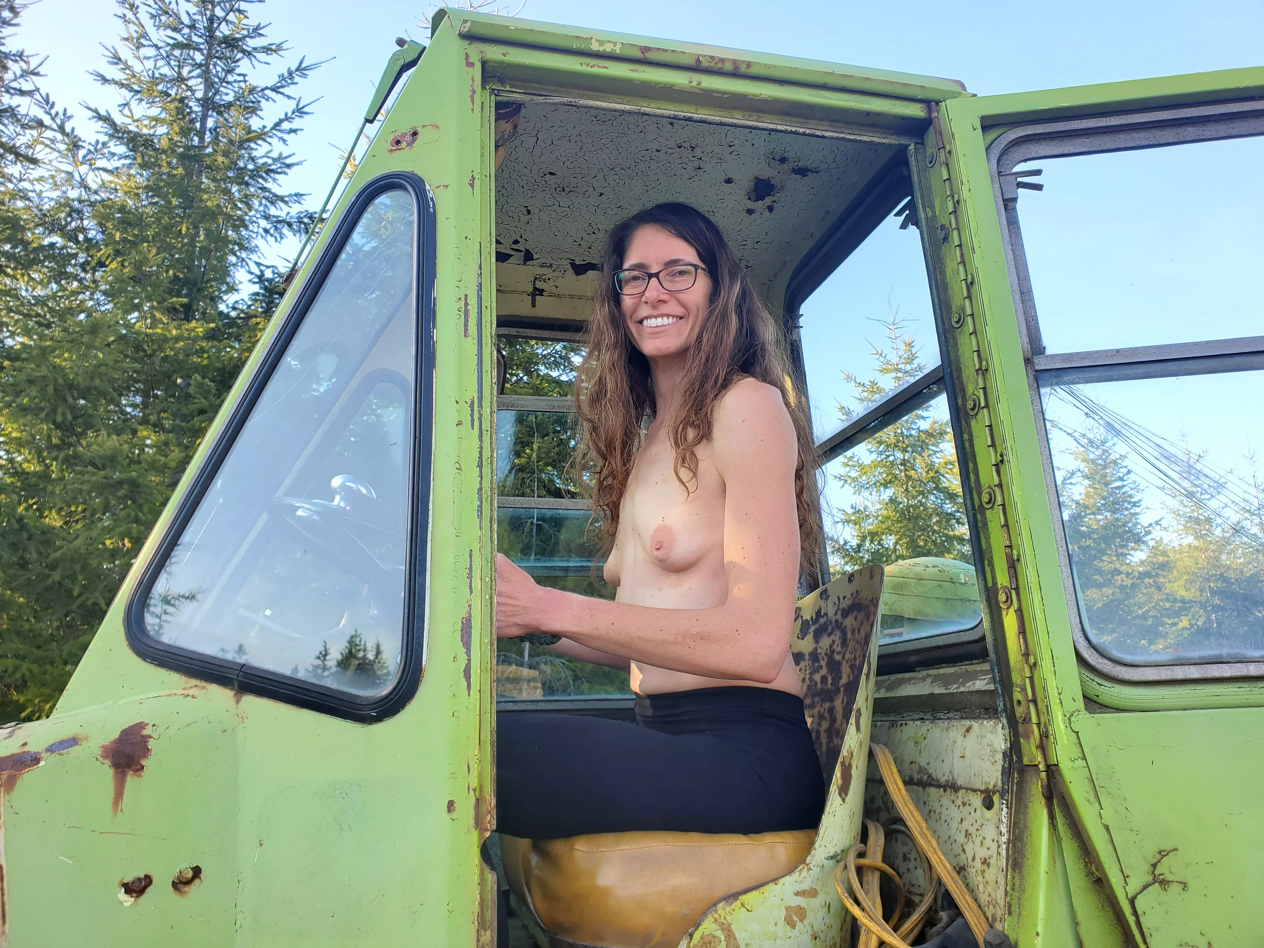 Don't leave unlocked logging equipment in the forest if you don't want my wife taking off her shirt, hopping up in the cab, and making 