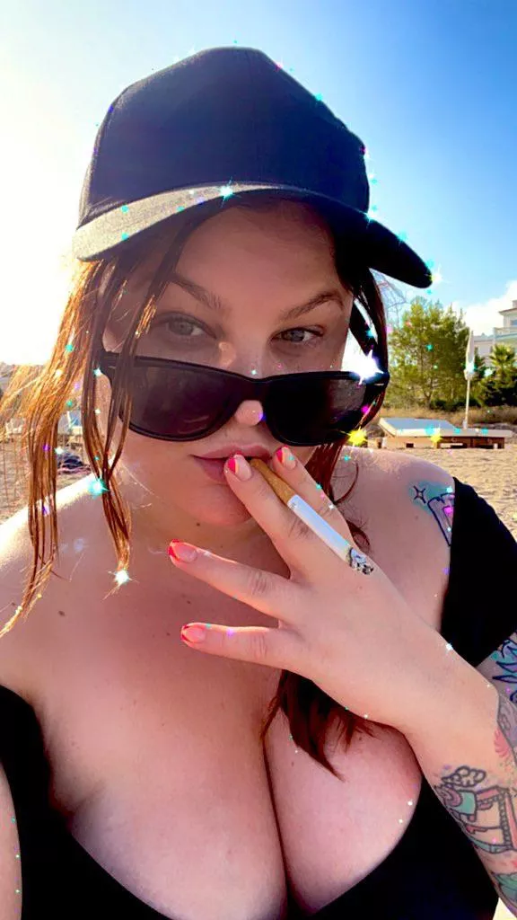 Enjoying a cigarette on the beach posted by Mistress_peach_