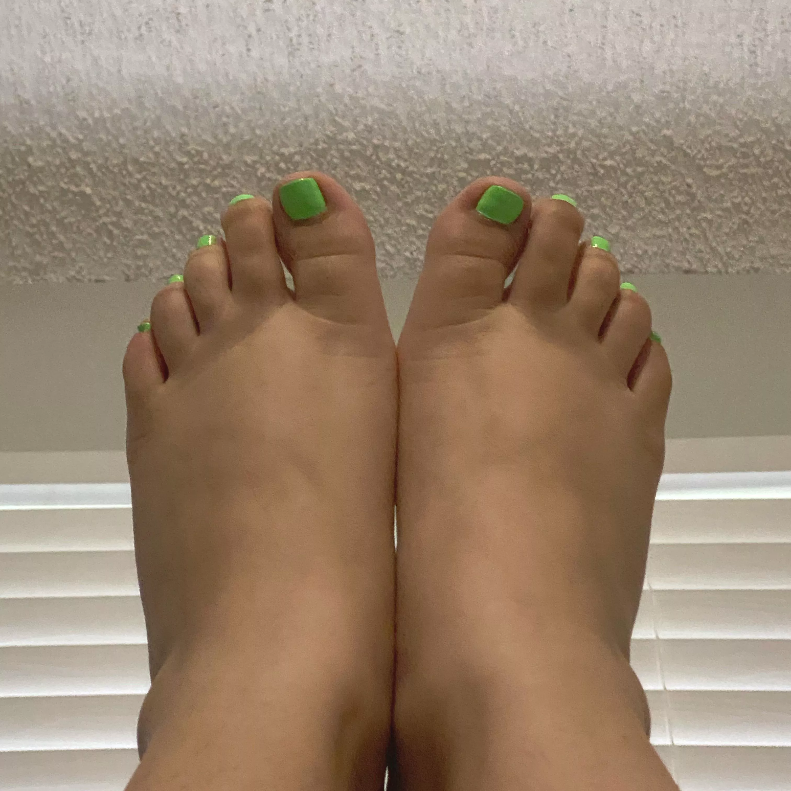 Feet up in the air because I just don’t care 💚👣🤪 posted by Emmababyyy69