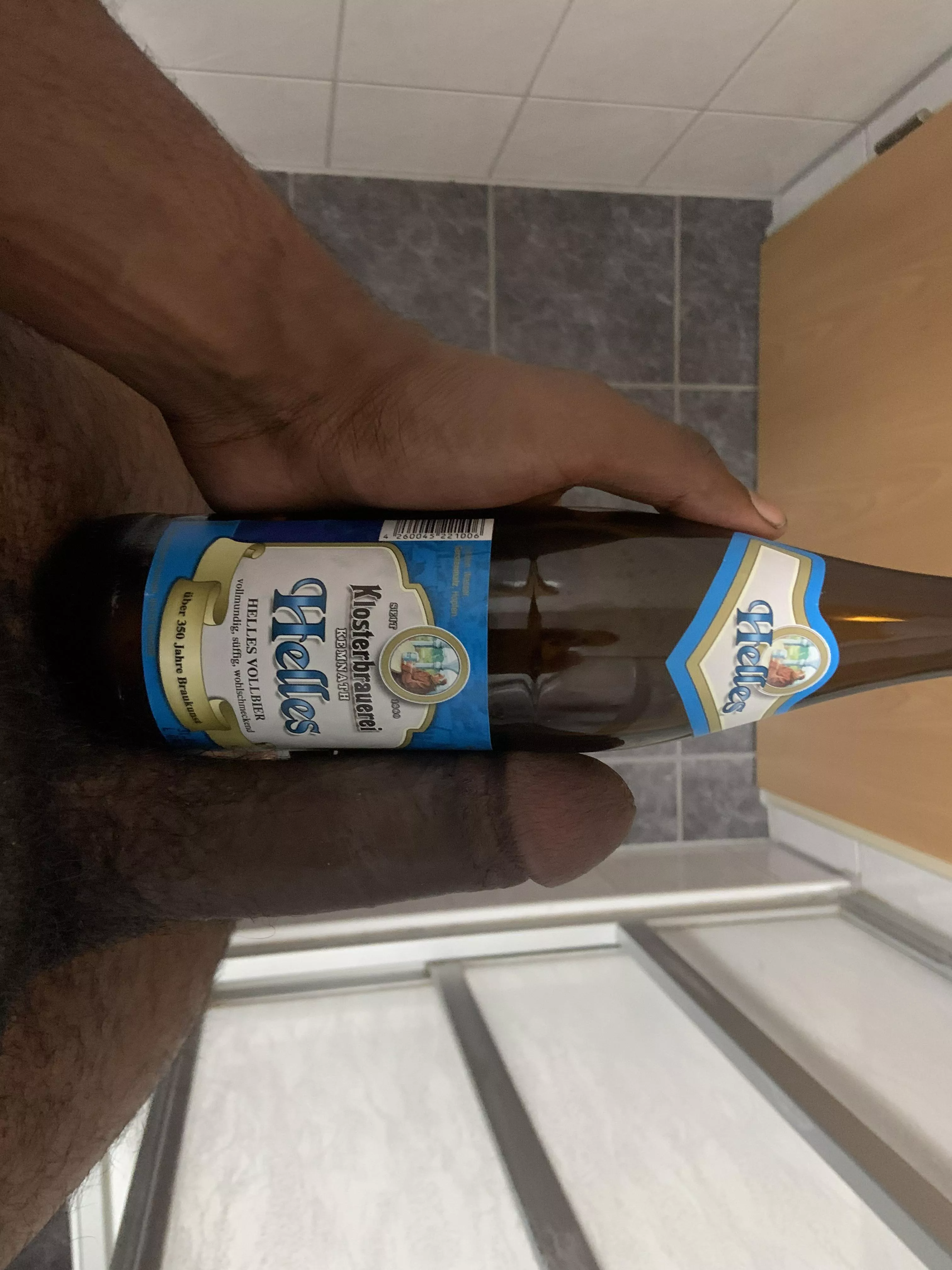 Flaccid dick next to a German beer. Maybe the next picture Iâ€™ll compare it while itâ€™s hard. posted by CaptainHook370