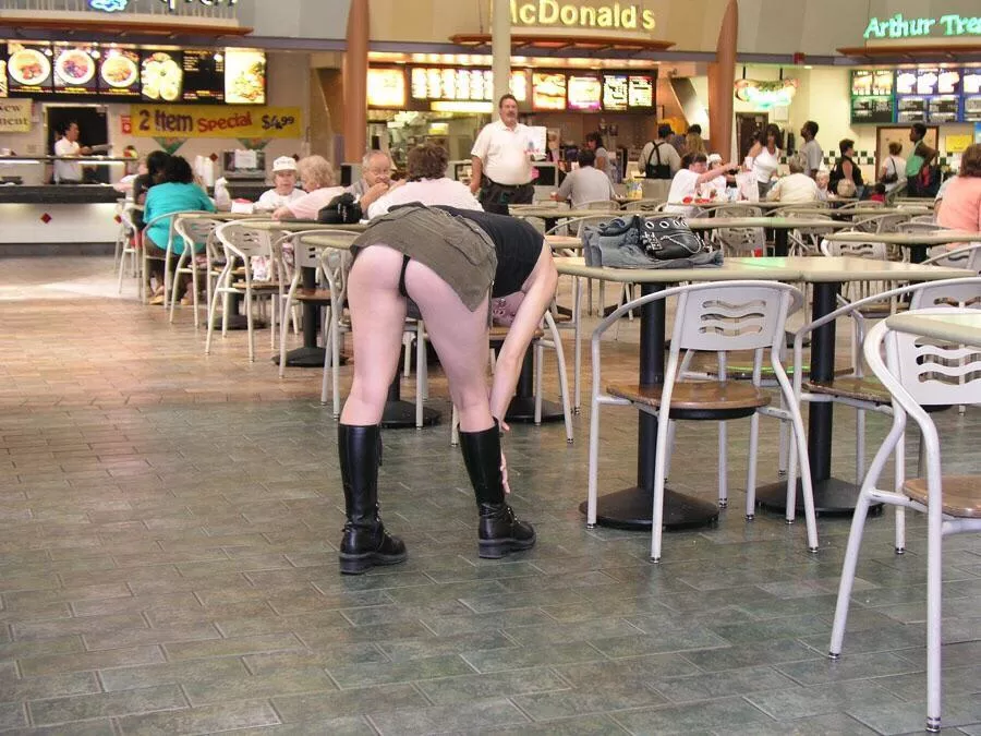 Flashing her ass in a crowded mall food court posted by [deleted]