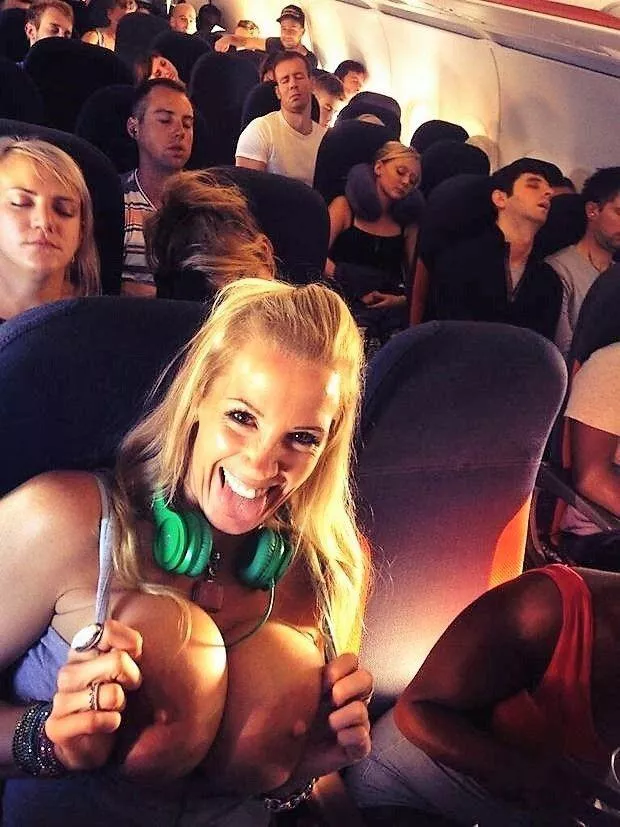 Flashing her bimbo tits on the plane posted by Jammer4_4