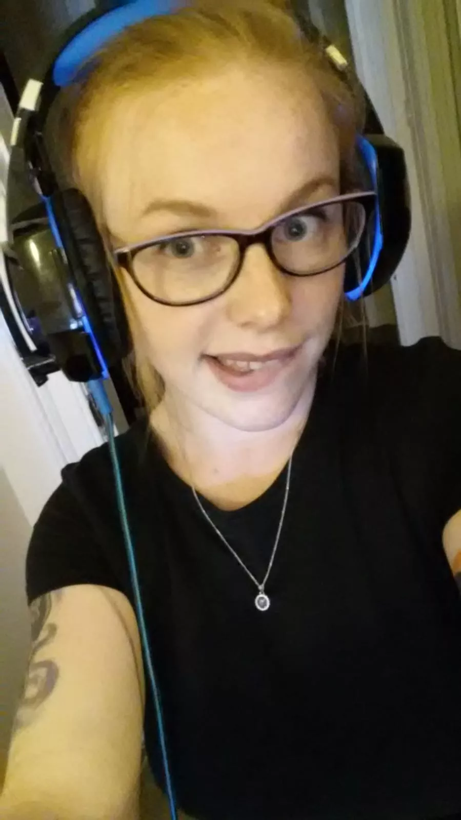 Found an old pic of me trying on his headset, it maybe too big for my small head! posted by cupcakelicious12