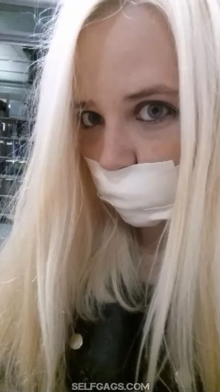 Gagged in public library posted by Selfgags