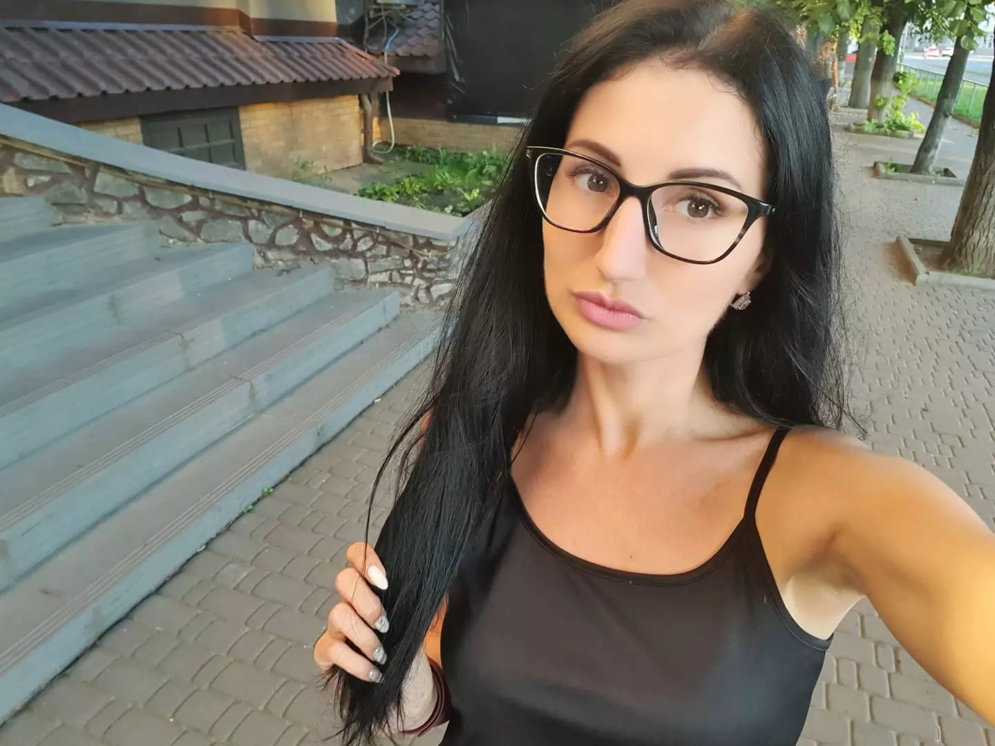 Girl with glasses in the streets of Ukraine 😍 posted by UkraineGirlChat