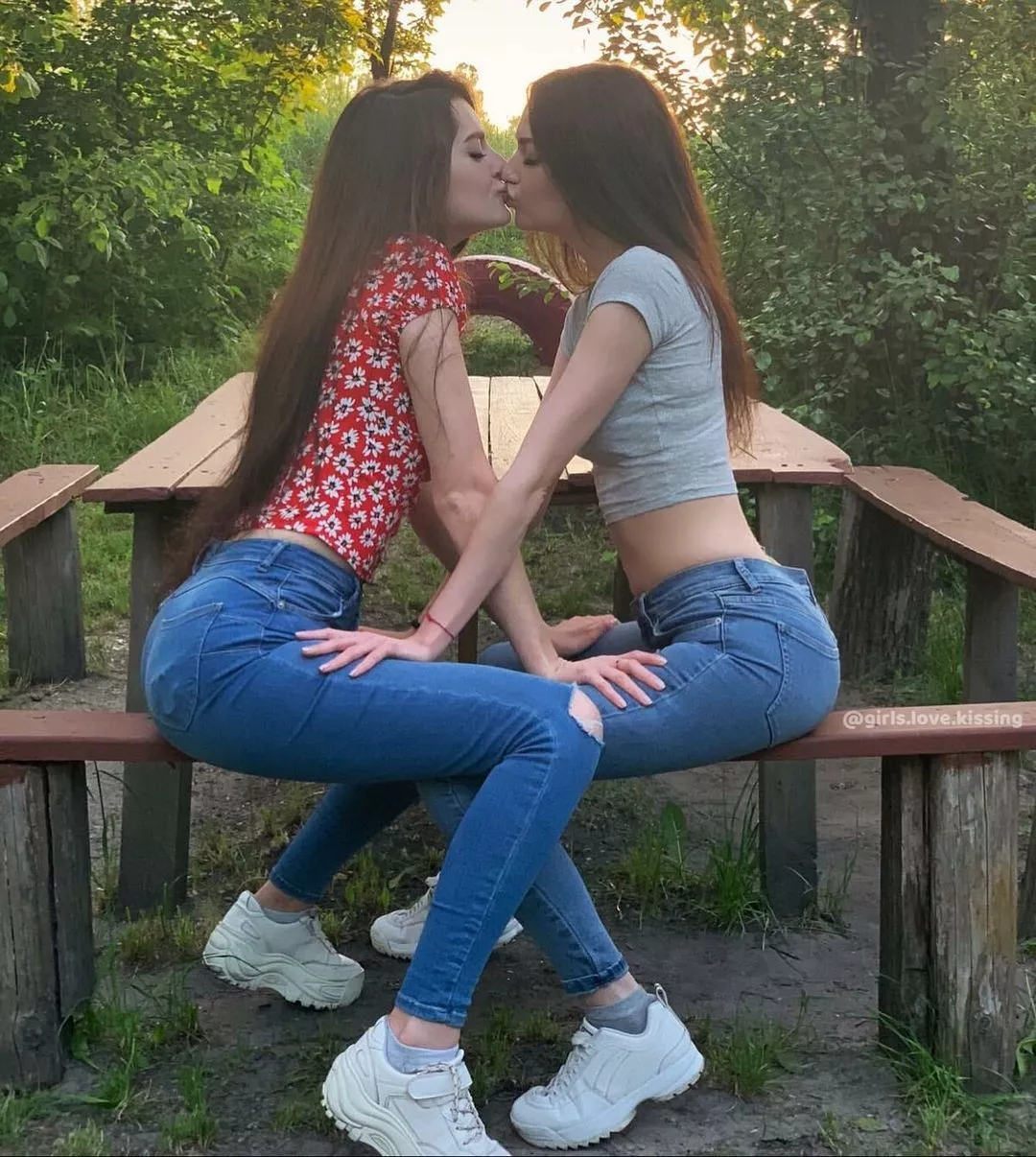 Girls sharing a kiss in the park posted by flyersfan124