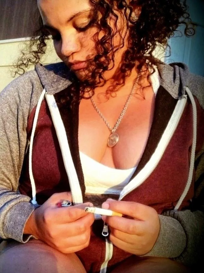 Gorgeous girl on the porch smoking posted by tjgreen77