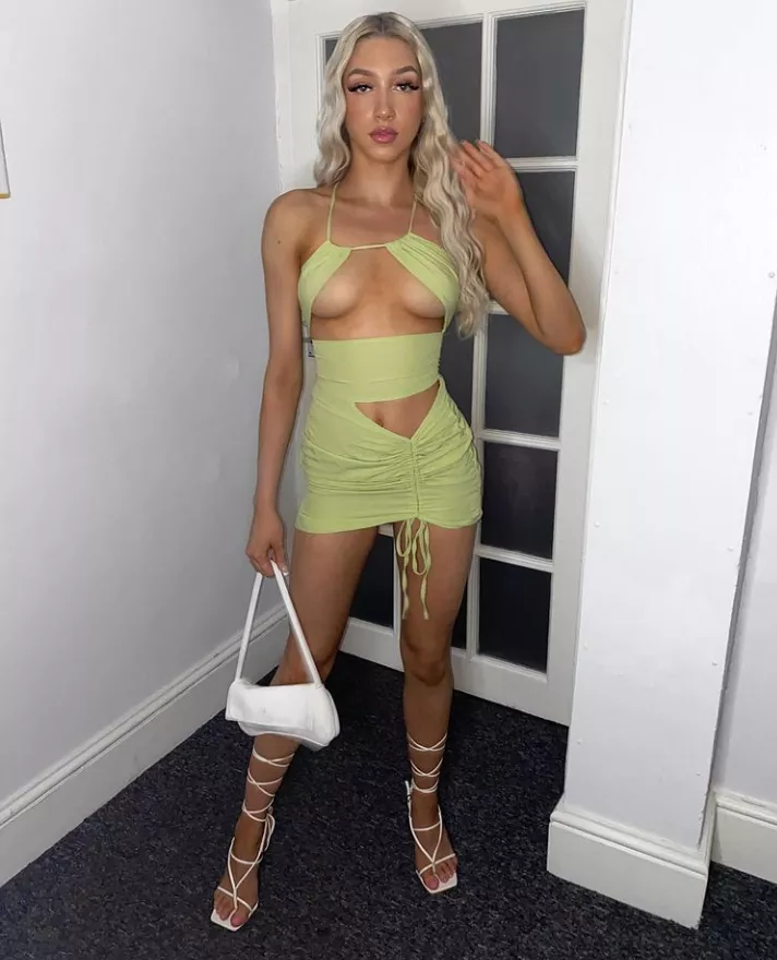 Green dress and heels posted by betaboy97