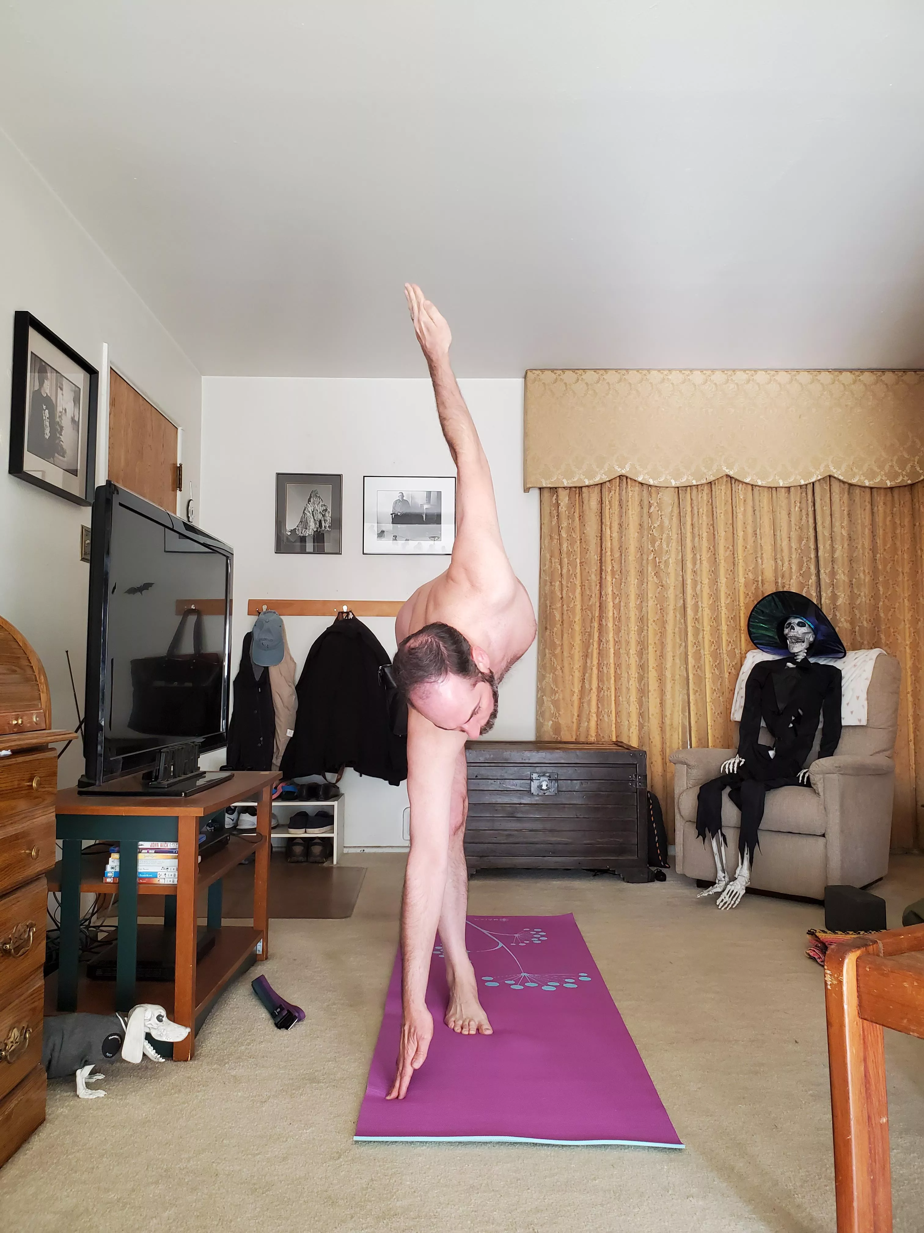 Half moon pose with Boneregaurd watching! posted by nacktyoginerd