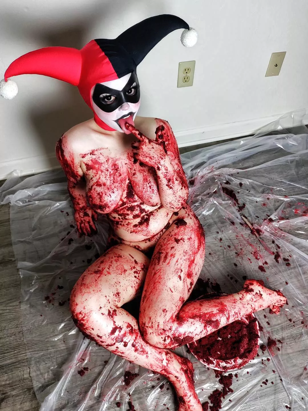 Harley Quinn got a little messy sitting on red velvet cake! posted by Scarlettclown