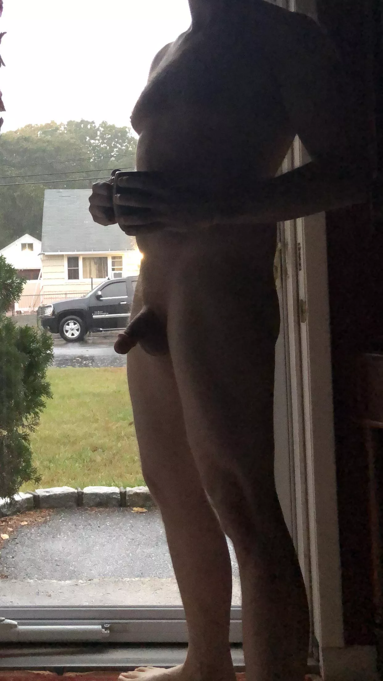 Here comes the rain again...the petite latina who lives across the street gave me a friendly wave as she took the trash to the curb in her wet nightie. posted by NudistAwareness