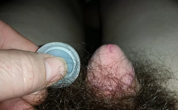 Here is a pic I took a while ago with me comparing my halfway hard penis to a water bottle cap.. posted by Critical_Main_6283