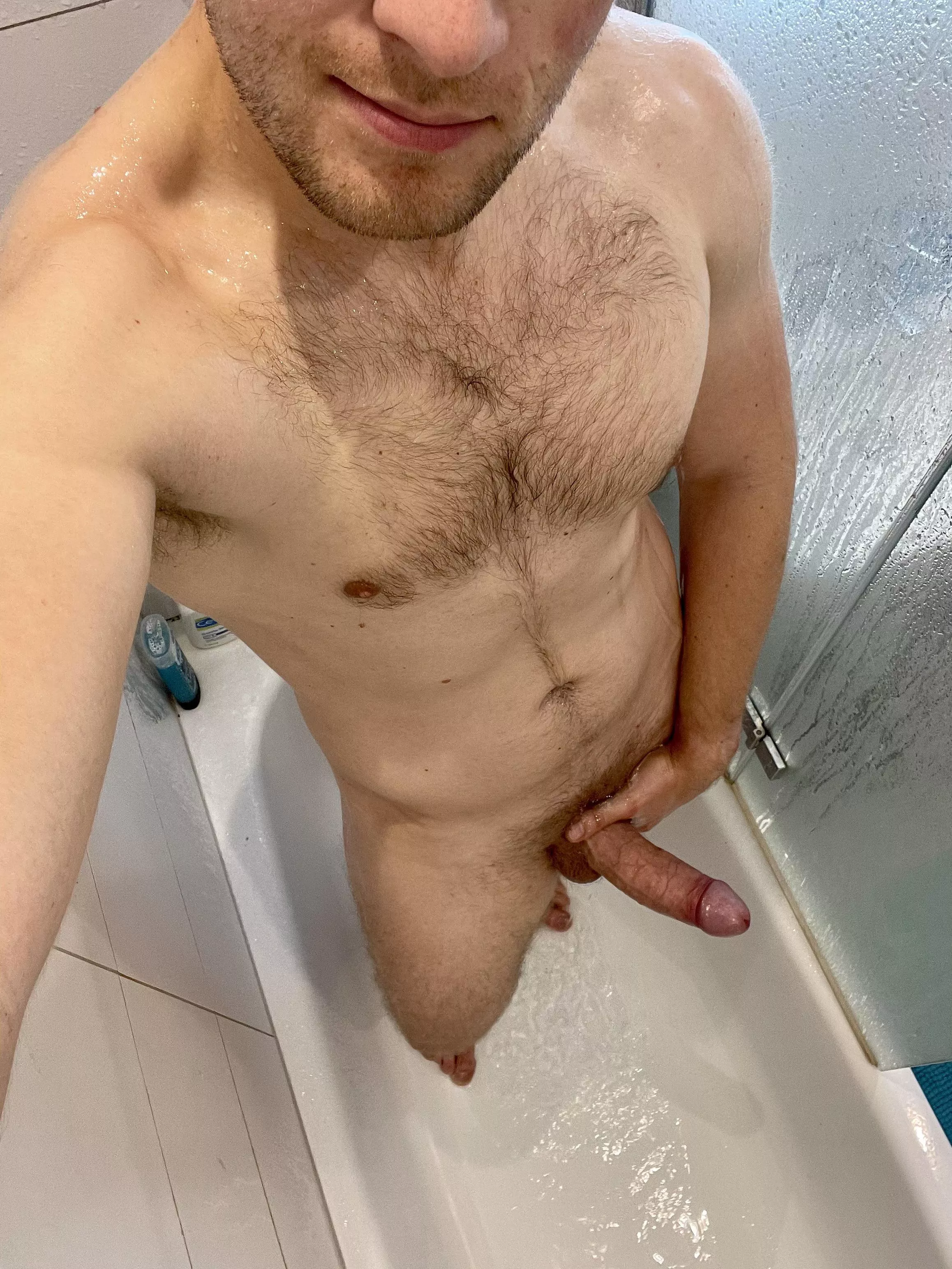 Horny in the shower posted by manslut2