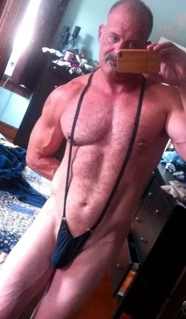 Hot daddy in a slingkini posted by SevenNSFW