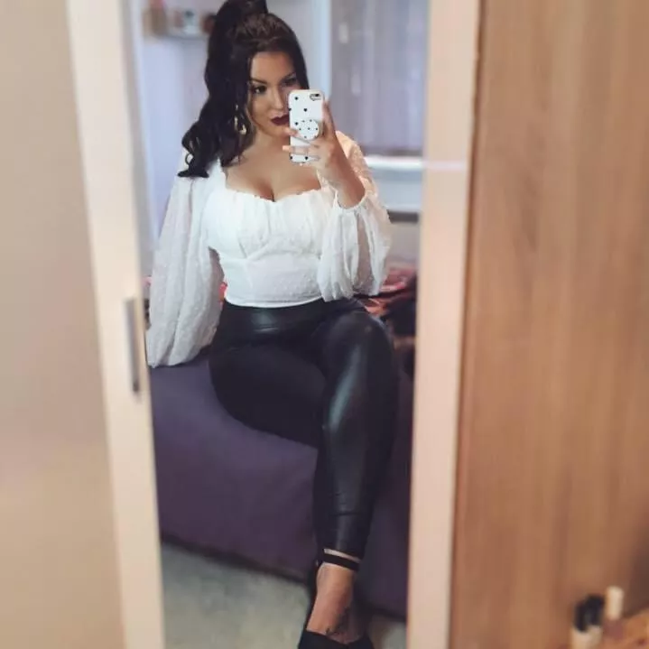 How sexy does she look in shiny leather leggings? posted by shiny_fanx